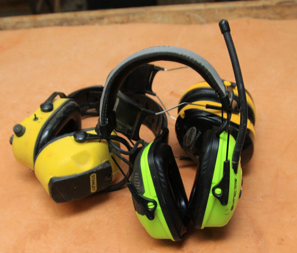 three ear muff noise protectors in a group.