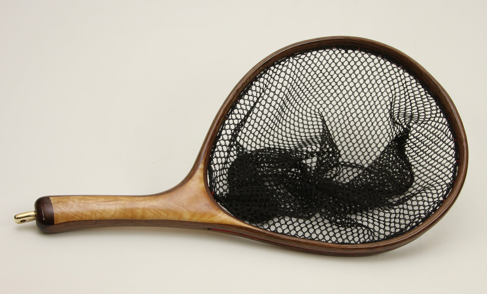 Smaller sized landing net with Uniquely shaped handle
