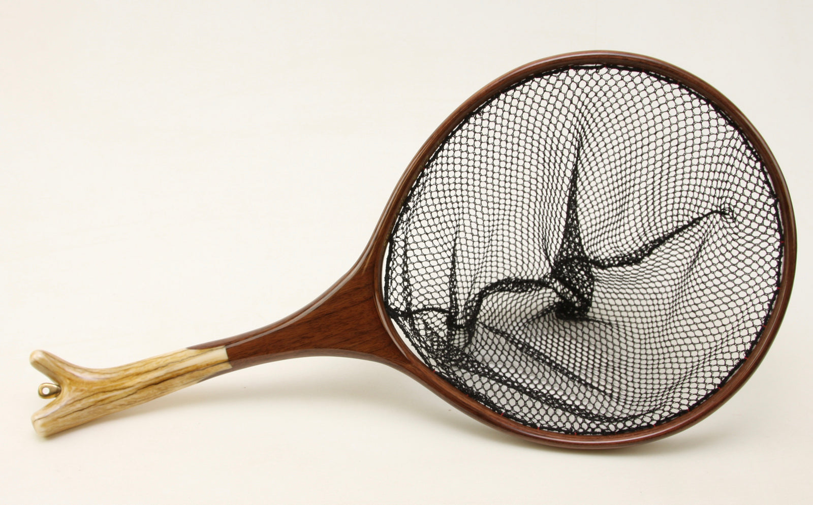 Custom landing net with walnut hoop and elk antler handle.