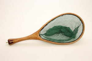 A landing net with cherry and multiple other woods. 