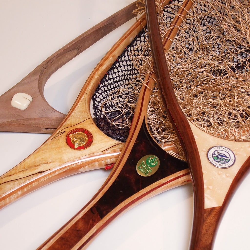 Customizing a wooden landing net with inlays and art work. - Nets