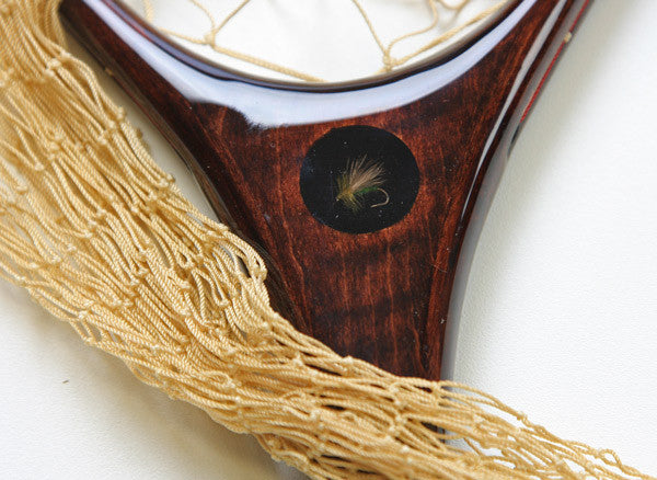 Customizing a wooden landing net with inlays and art work