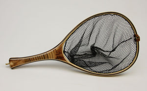 Custom landing net with segmented bamboo handle.