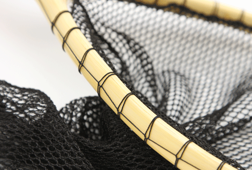 Medium sized landing net with Uniquely carved cherry handle